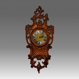 211/1 Orologio da parete in legno Intagliato finitura noce.