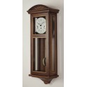 Drago Wall clock in Walnut.